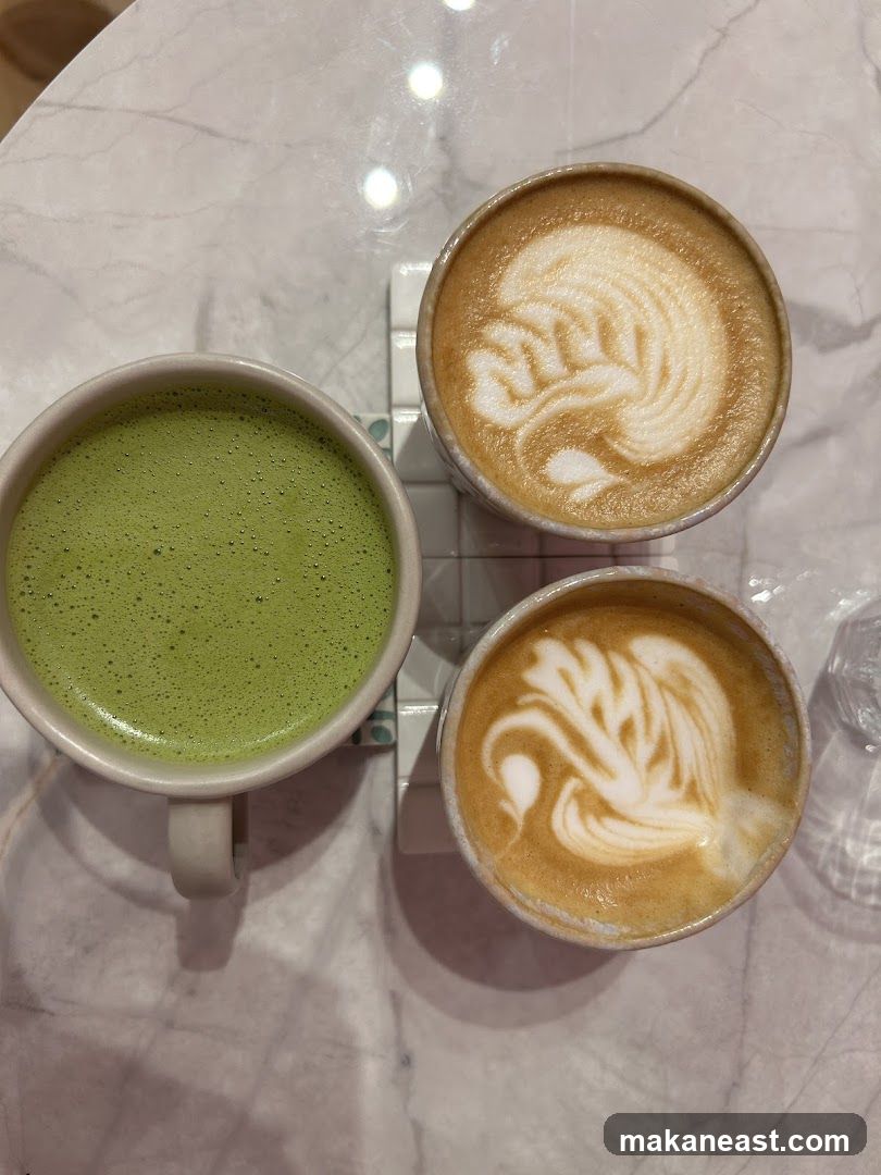 Three drinks with latte art