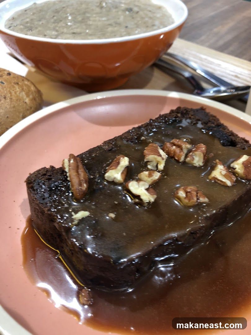 Chocolate Cake with Caramel Sauce and Pecans