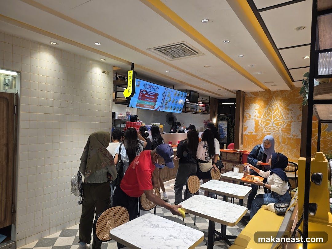 Customers Ordering at a Food Counter