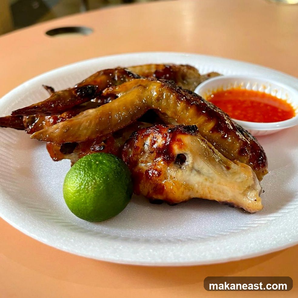Grilled Chicken Wings with Chili Sauce and Lime