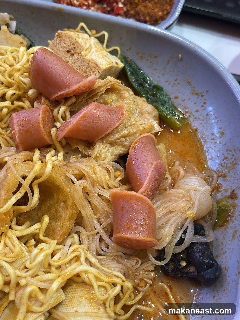 Spicy Noodle Dish with Sausages
