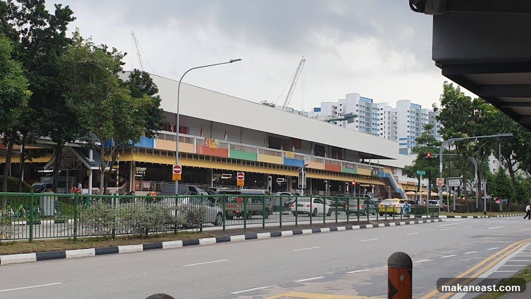 Street view of a market or food court building
