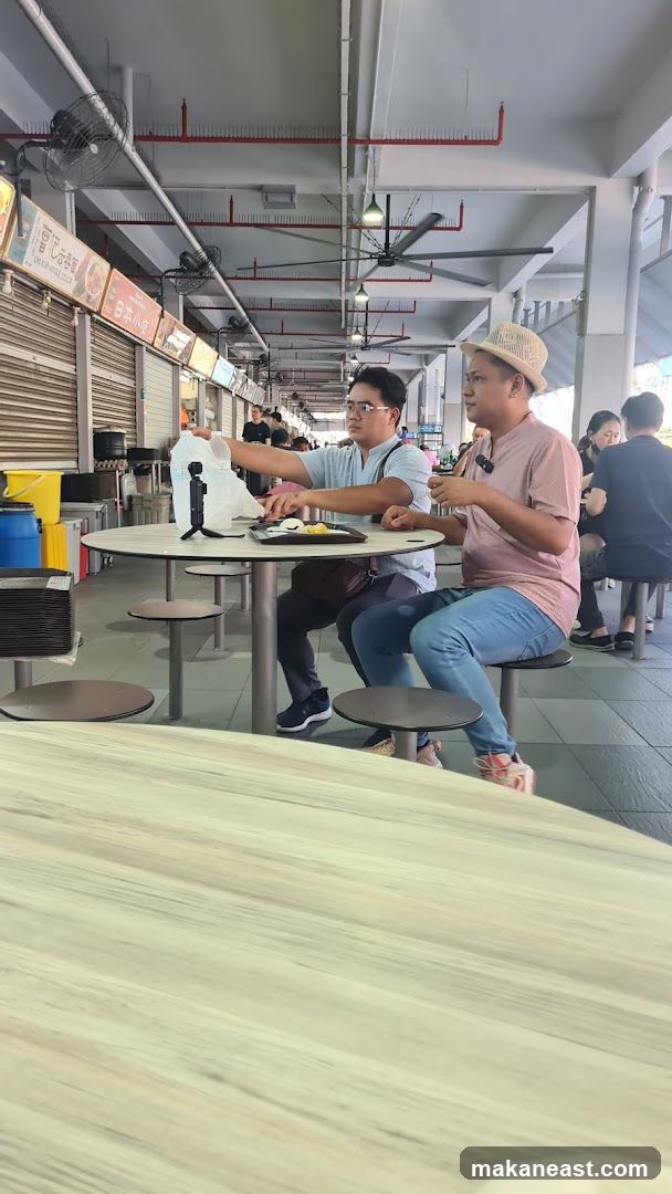 People eating at a food court