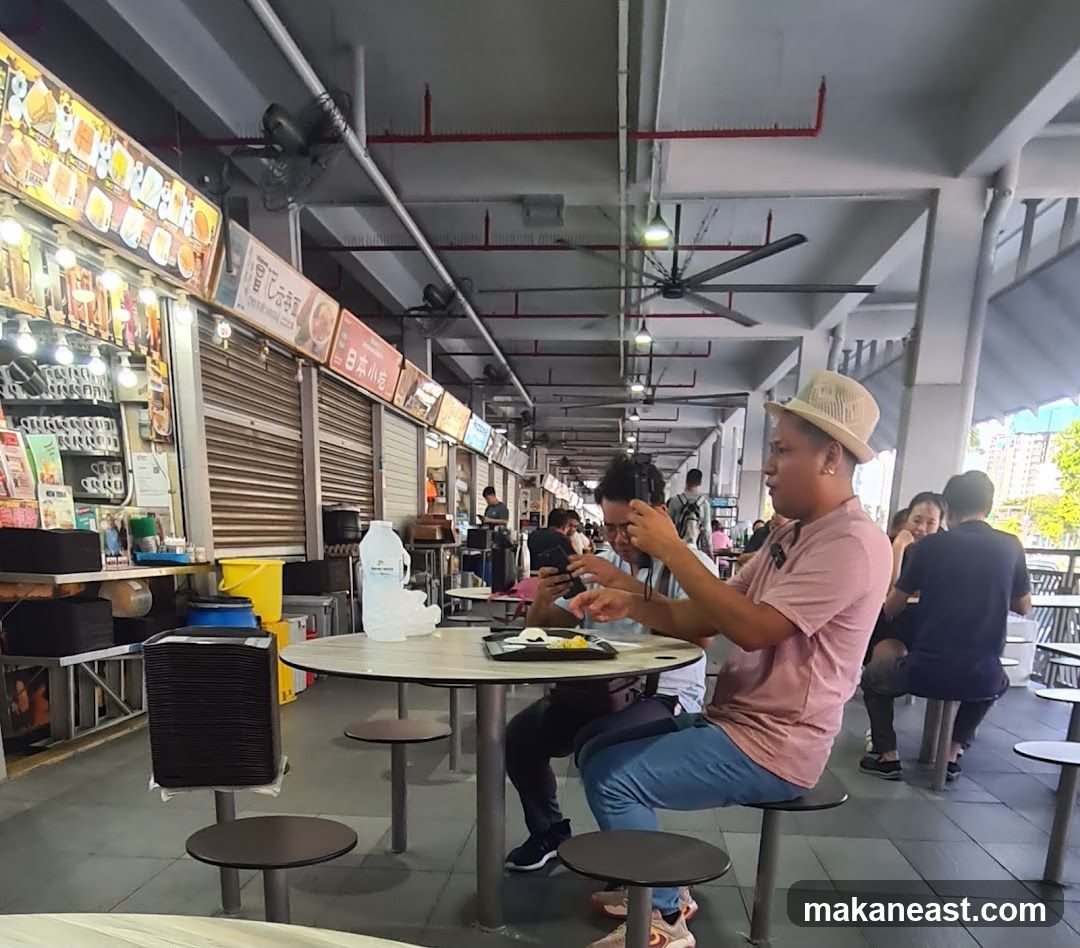 People dining at a food court