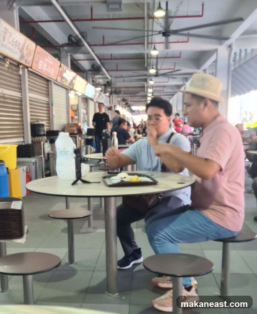 People eating at a food court