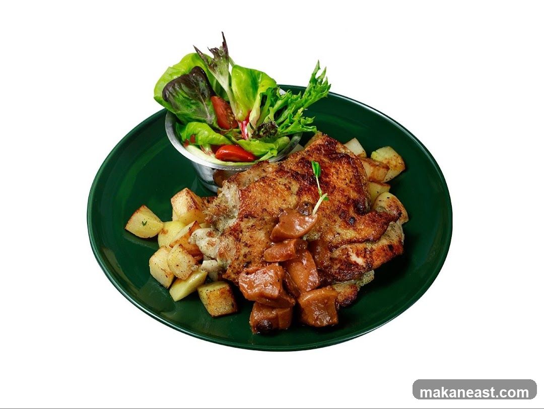 Chicken dish with potatoes and salad