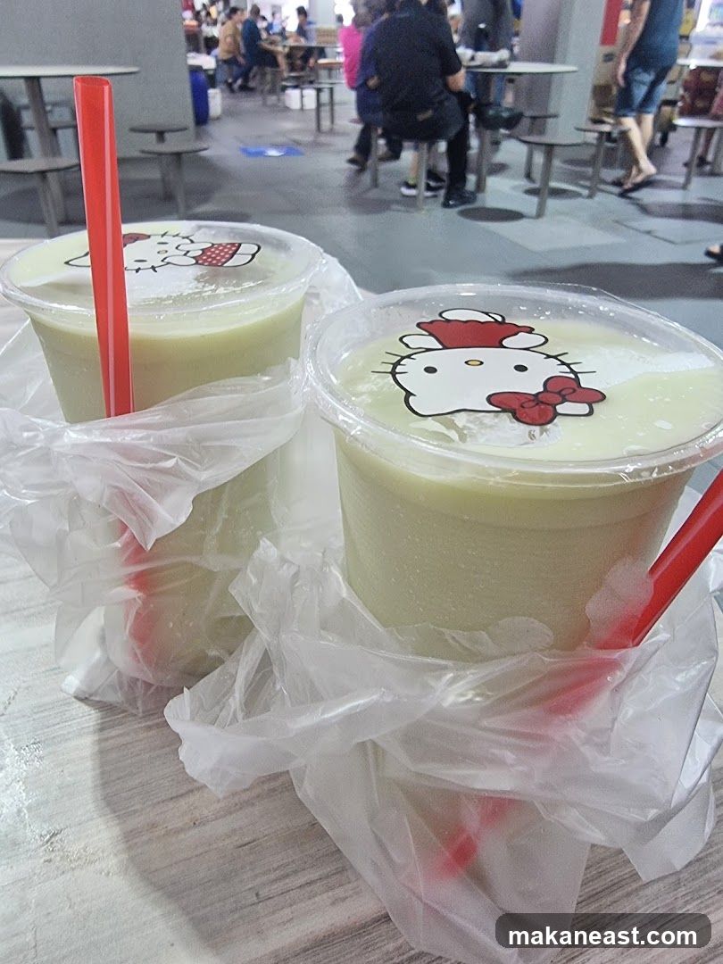 Two drinks with Hello Kitty stickers
