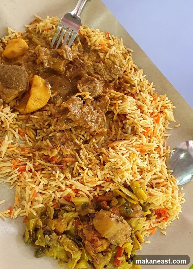 Plate of Biryani with Meat and Vegetables