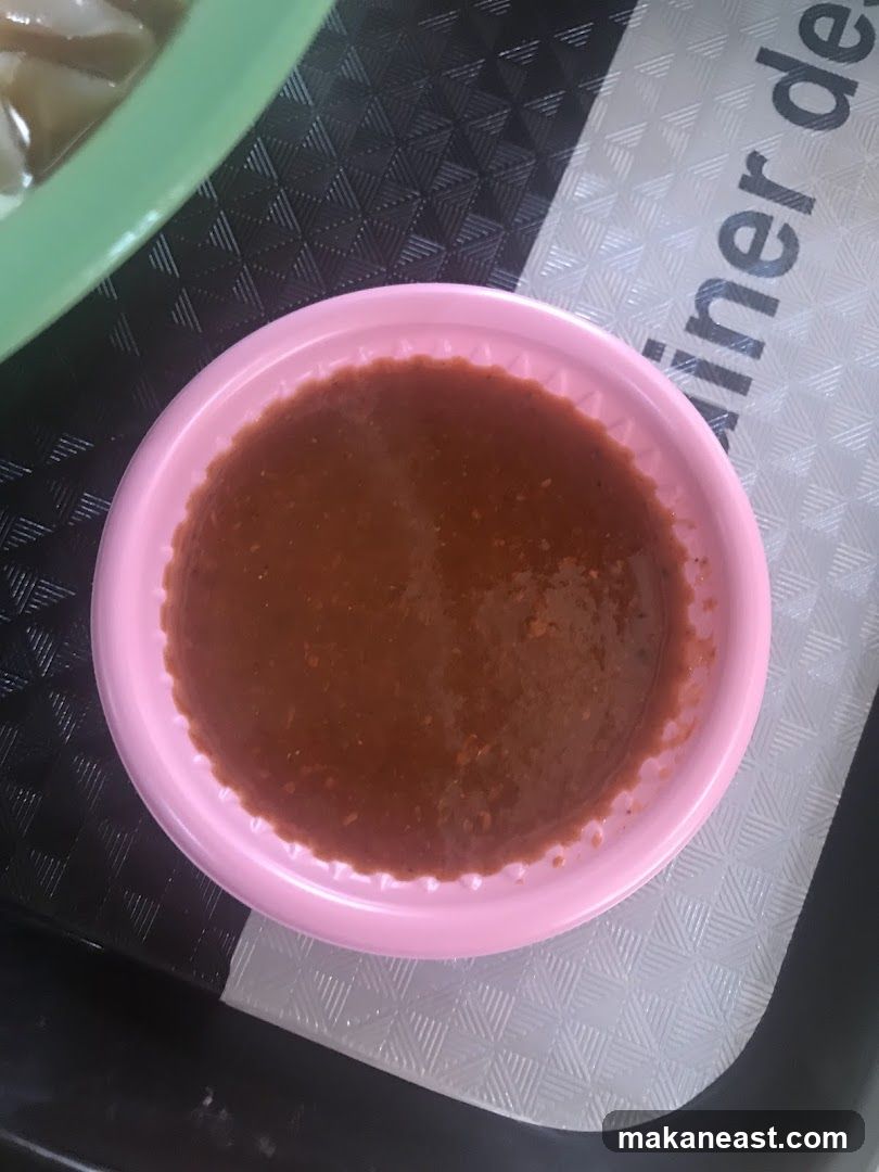 Sauce in a pink bowl