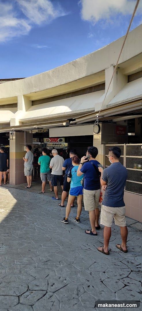 People queuing at a food stall