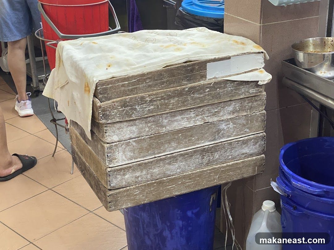 Stack of wooden boards covered with cloth