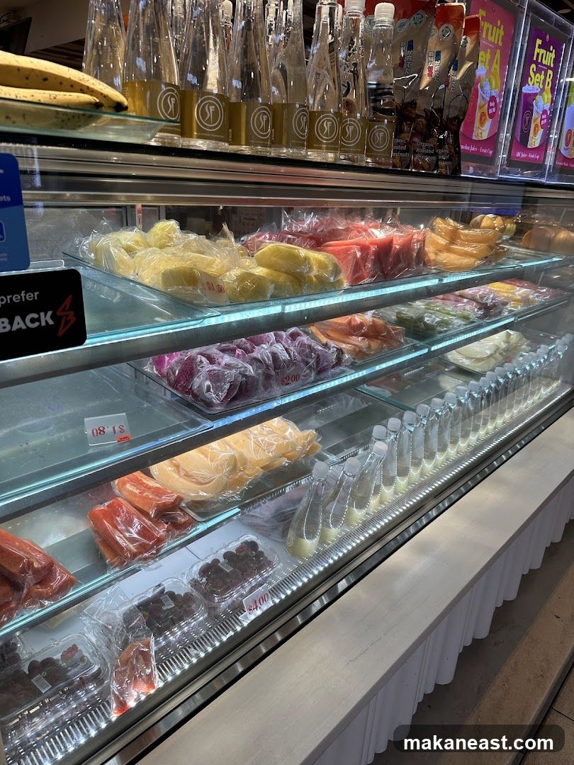 Refrigerated Display Case with Fruits and Drinks