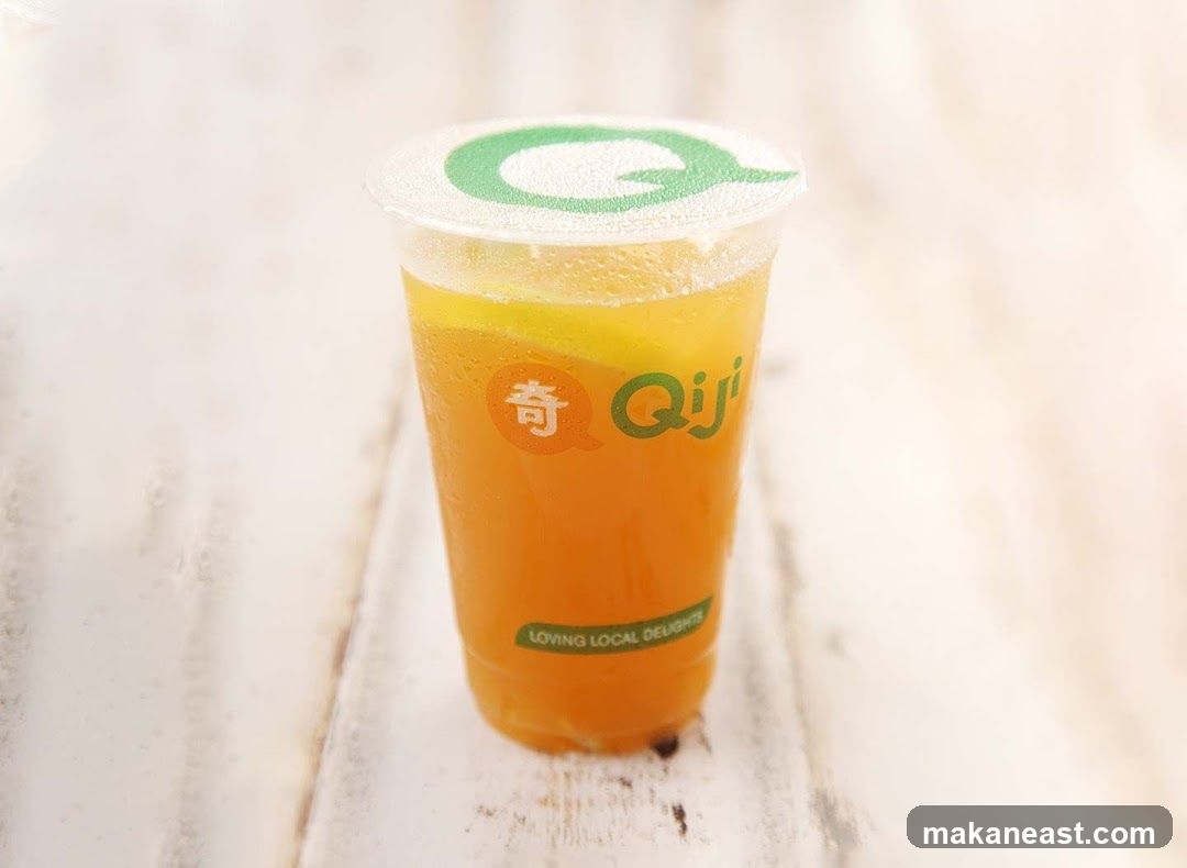 Orange Drink with Qiji Logo