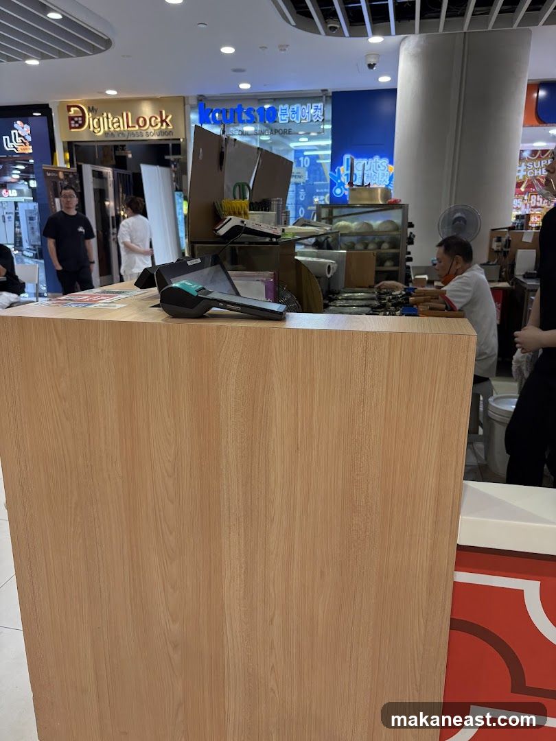 Counter with payment terminals and staff