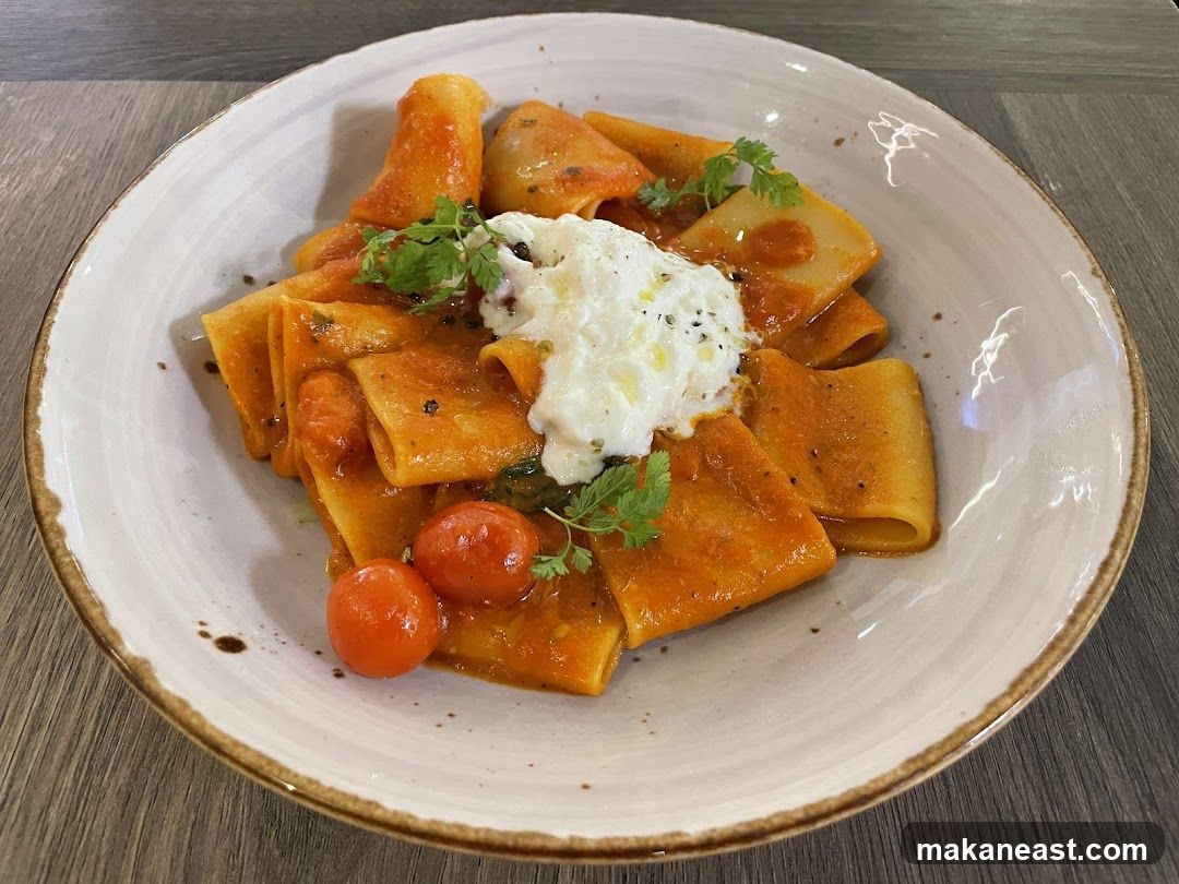 Paccheri pasta with tomato sauce and burrata