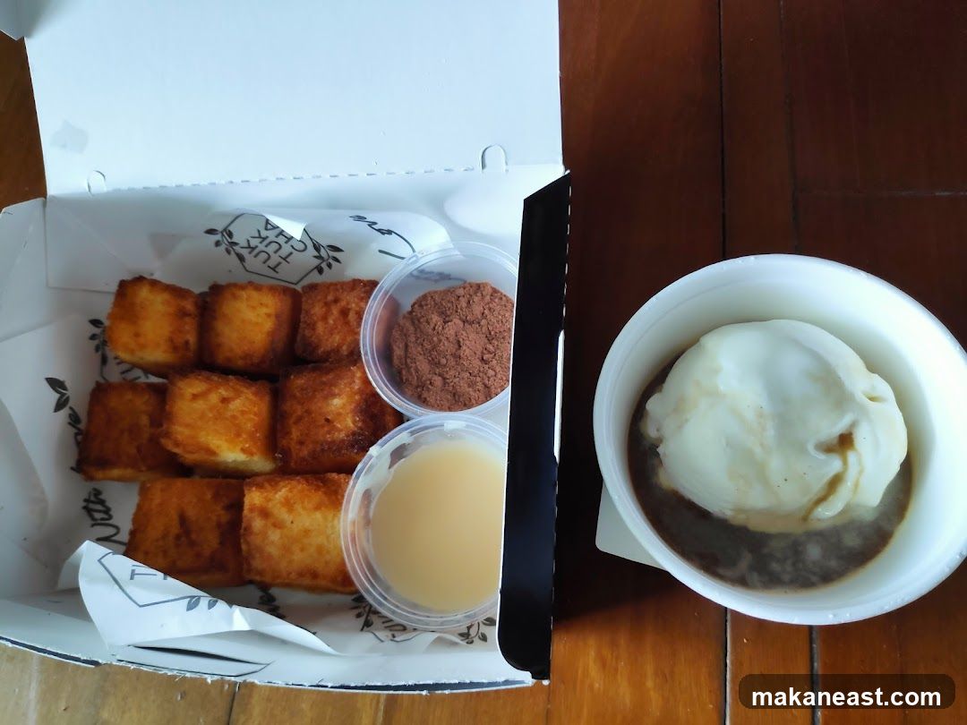 Fried bread with ice cream and toppings