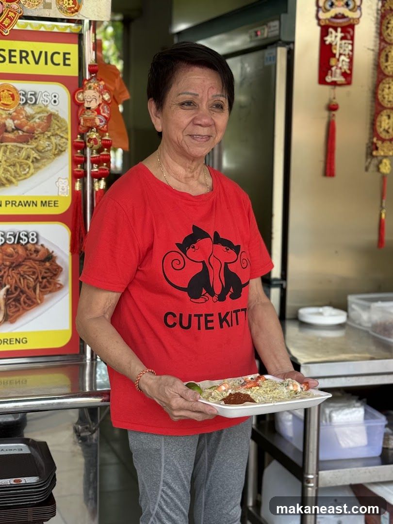 Woman Holding a Plate of Food