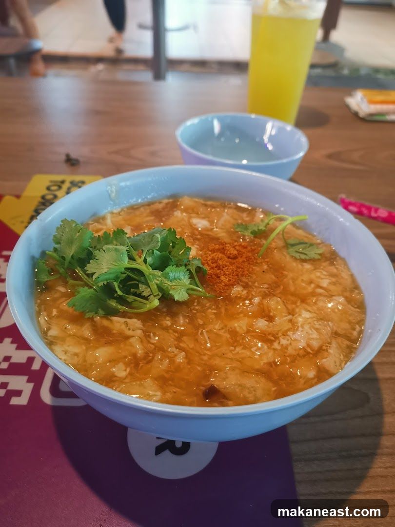 Bowl of soup with cilantro and spice