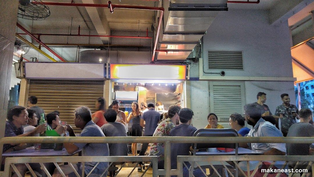 People dining at an outdoor eatery
