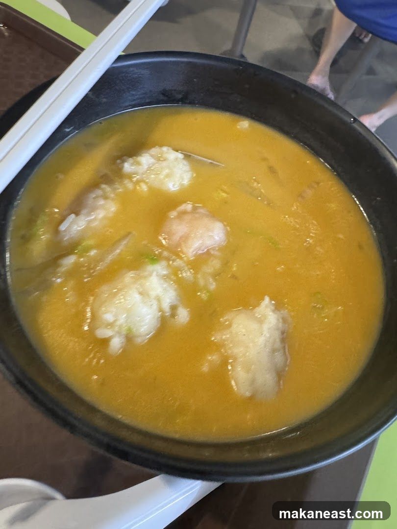 Bowl of Soup with Dumplings