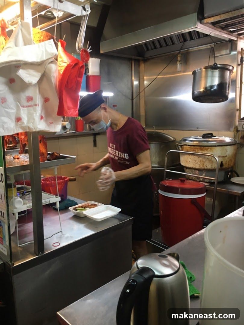 Food stall worker preparing a meal