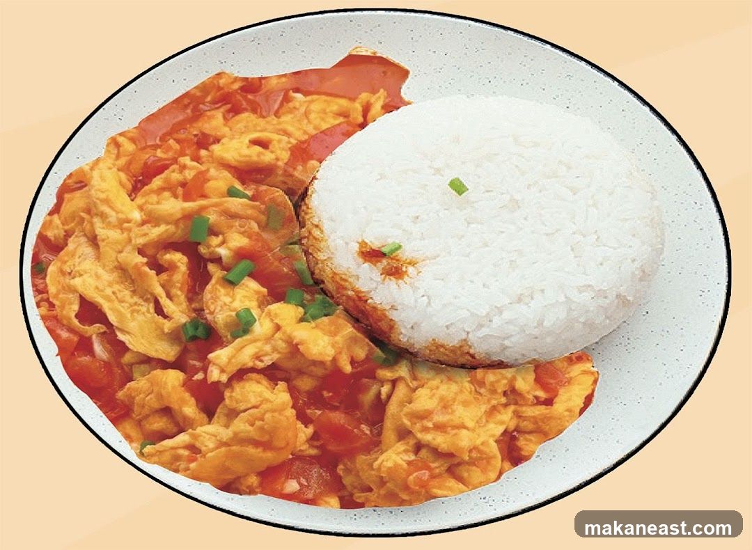 Scrambled Eggs with Tomatoes and Rice