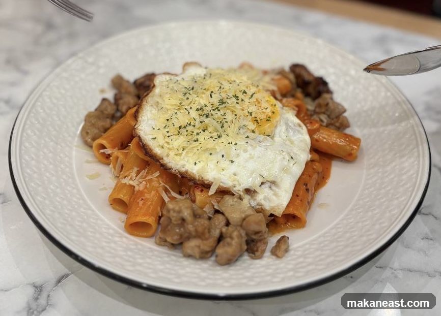 Pasta with Fried Egg and Sausage