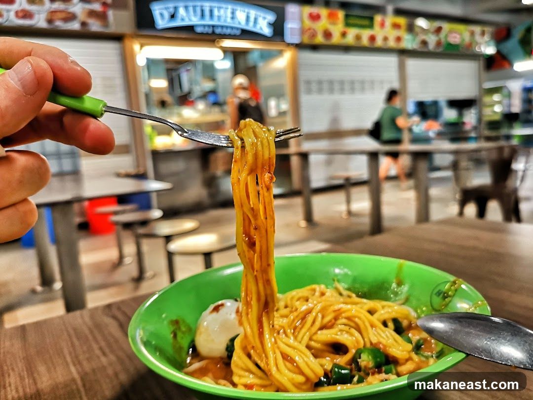 Noodles being lifted from a bowl
