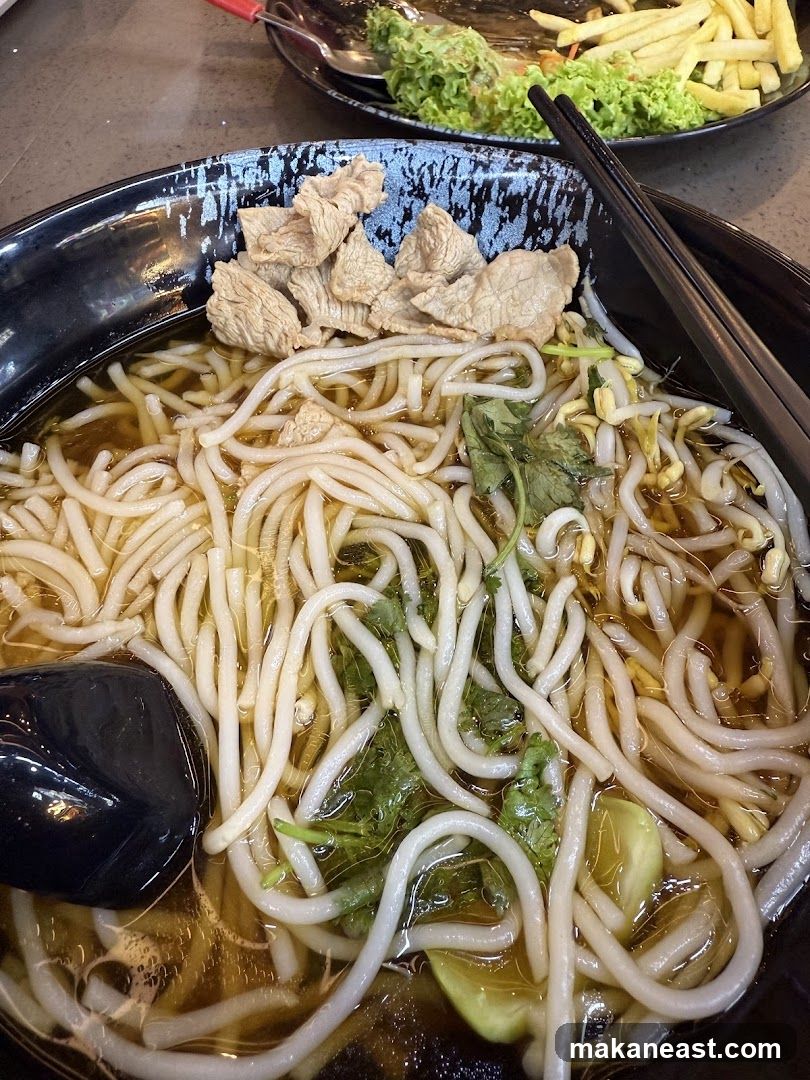 Noodle Soup with Meat and Fries