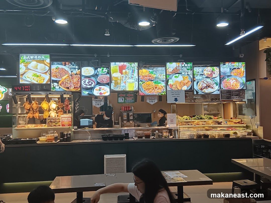 Food court stalls with digital menus and food displays