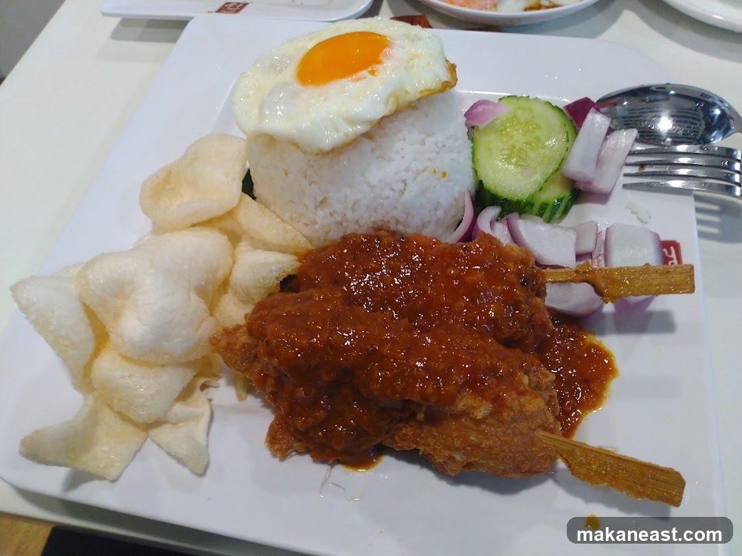 Chicken Satay with Rice and Fried Egg