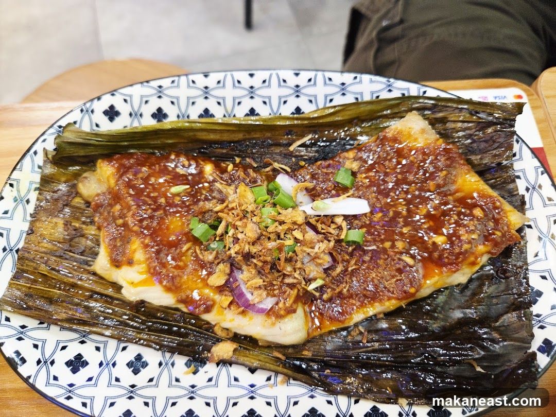 Fish dish with sauce and toppings