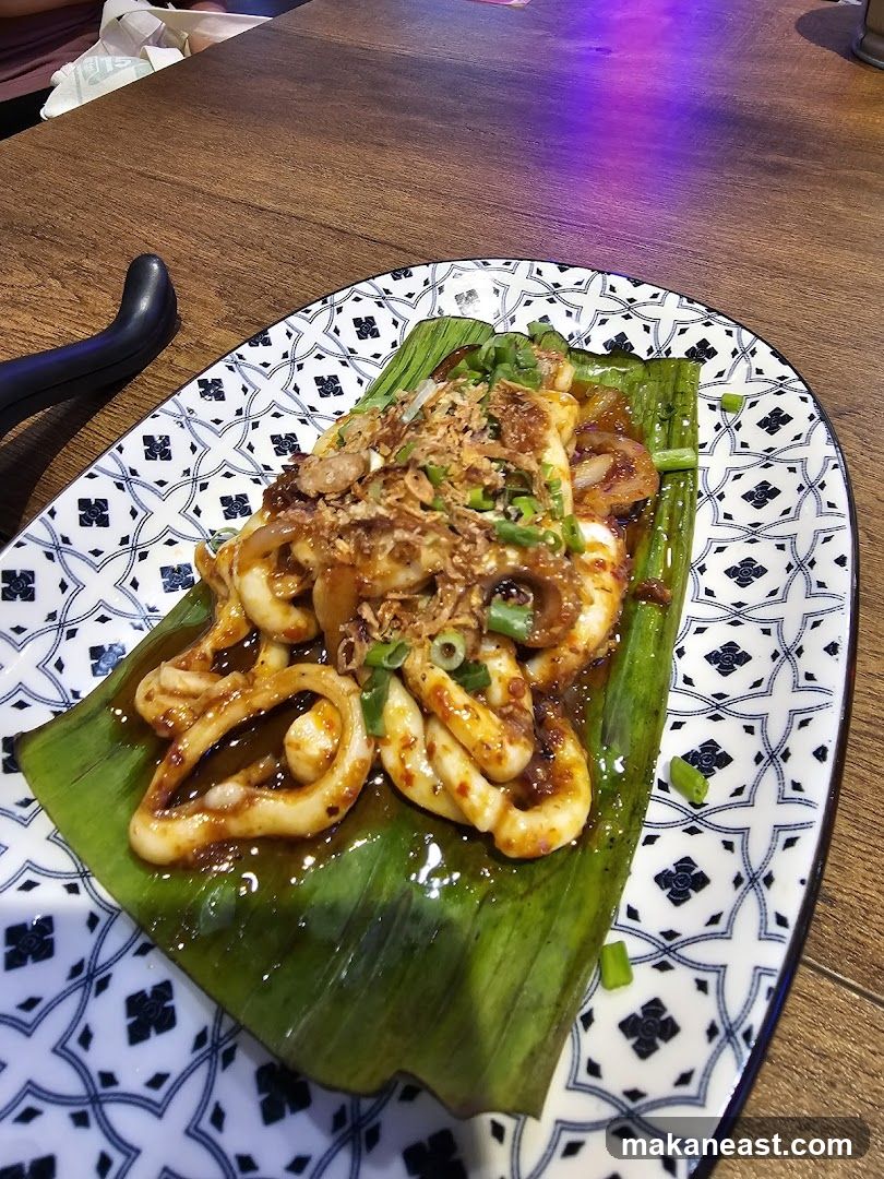 Squid dish on banana leaf