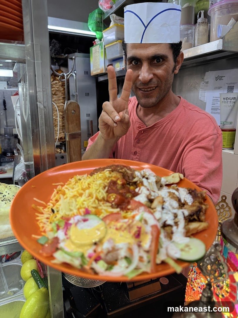 Man holding a plate of food