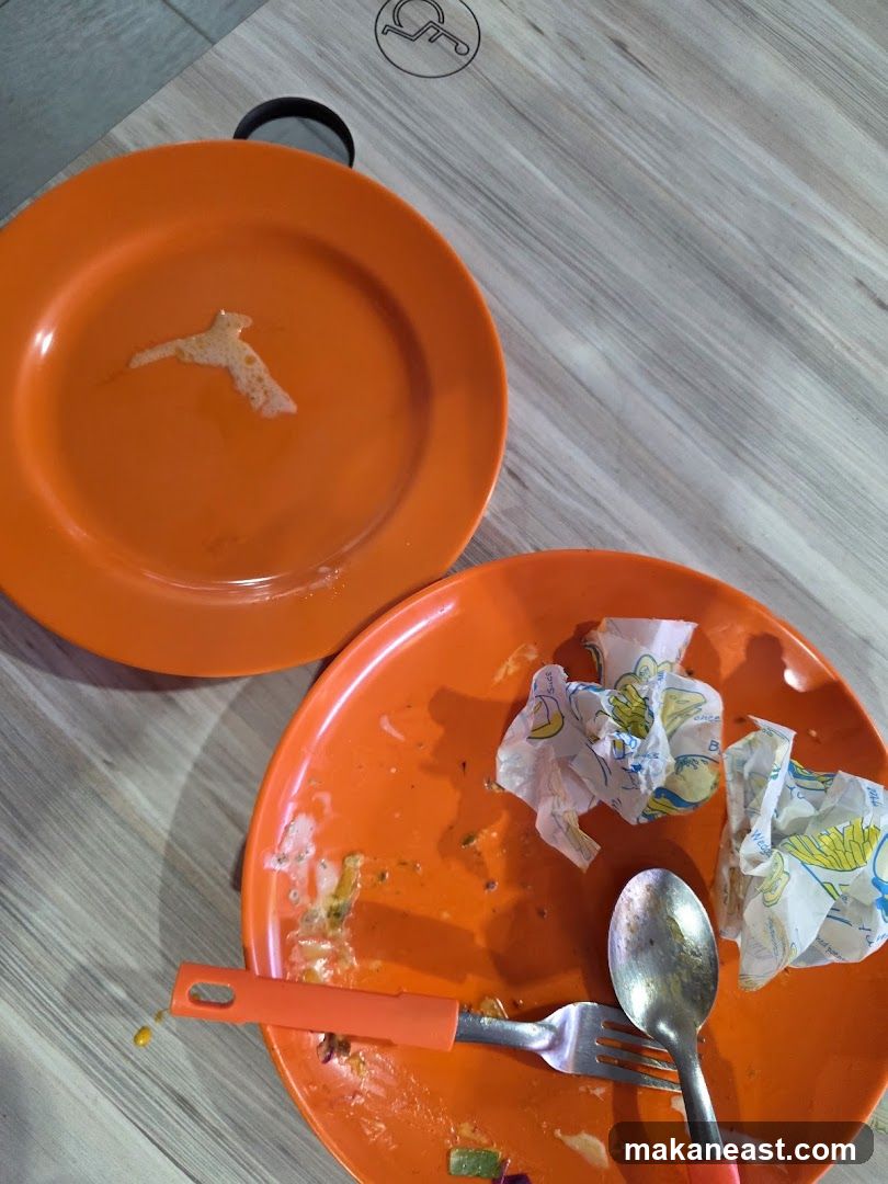 Dirty Plates with Utensils