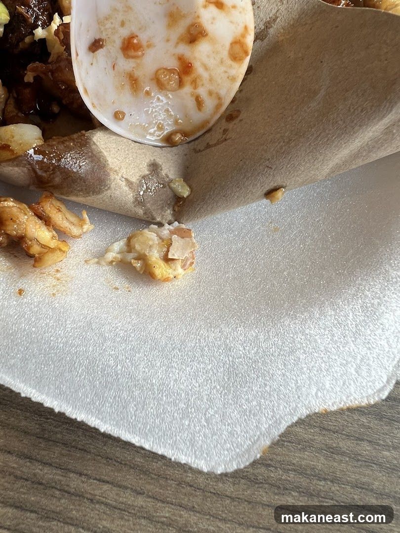 Close-up of food remnants on disposable packaging