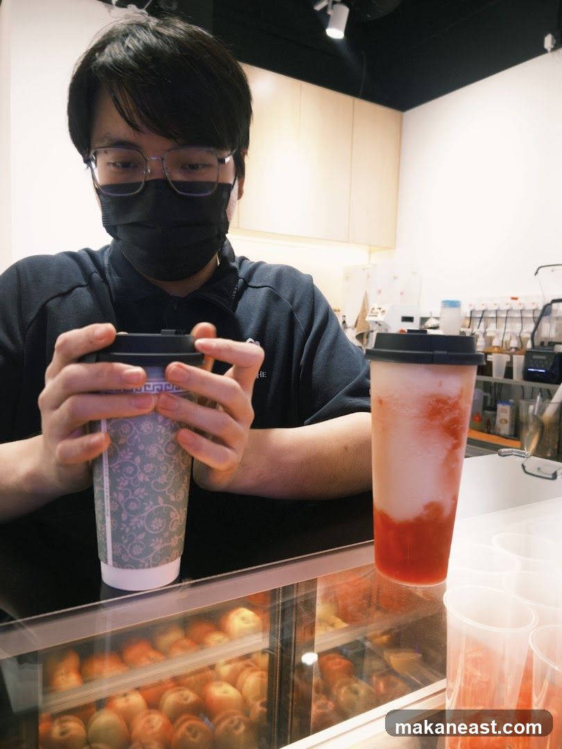 Barista with drinks