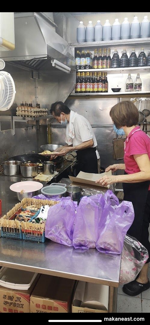 Kitchen Staff Preparing Food