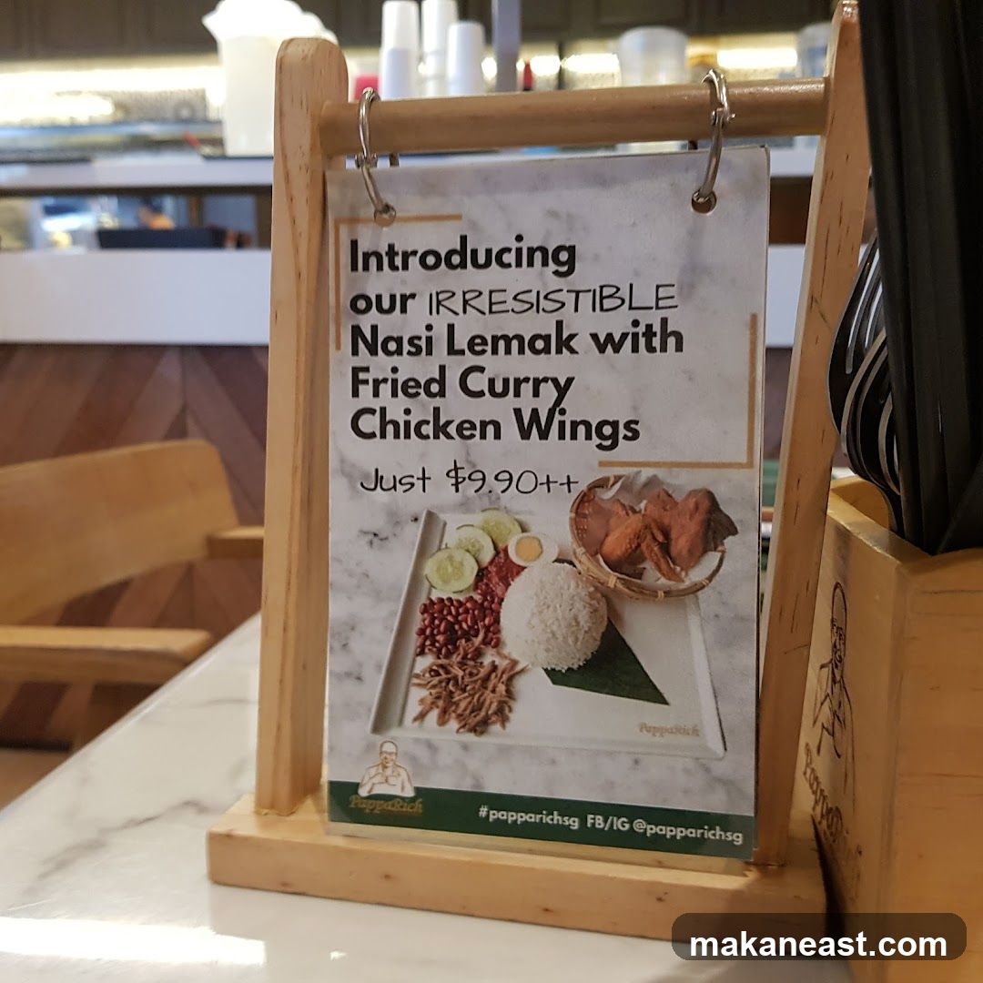 Nasi Lemak with Fried Curry Chicken Wings