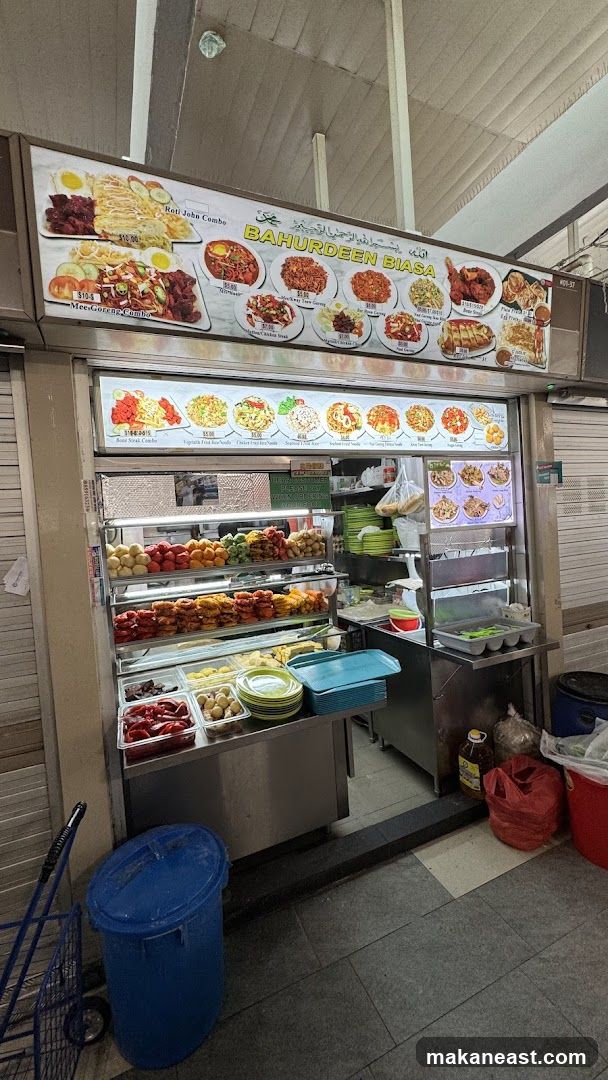 Food stall with menu and display of food items