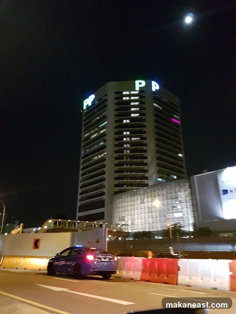 Cityscape at Night with Illuminated Building