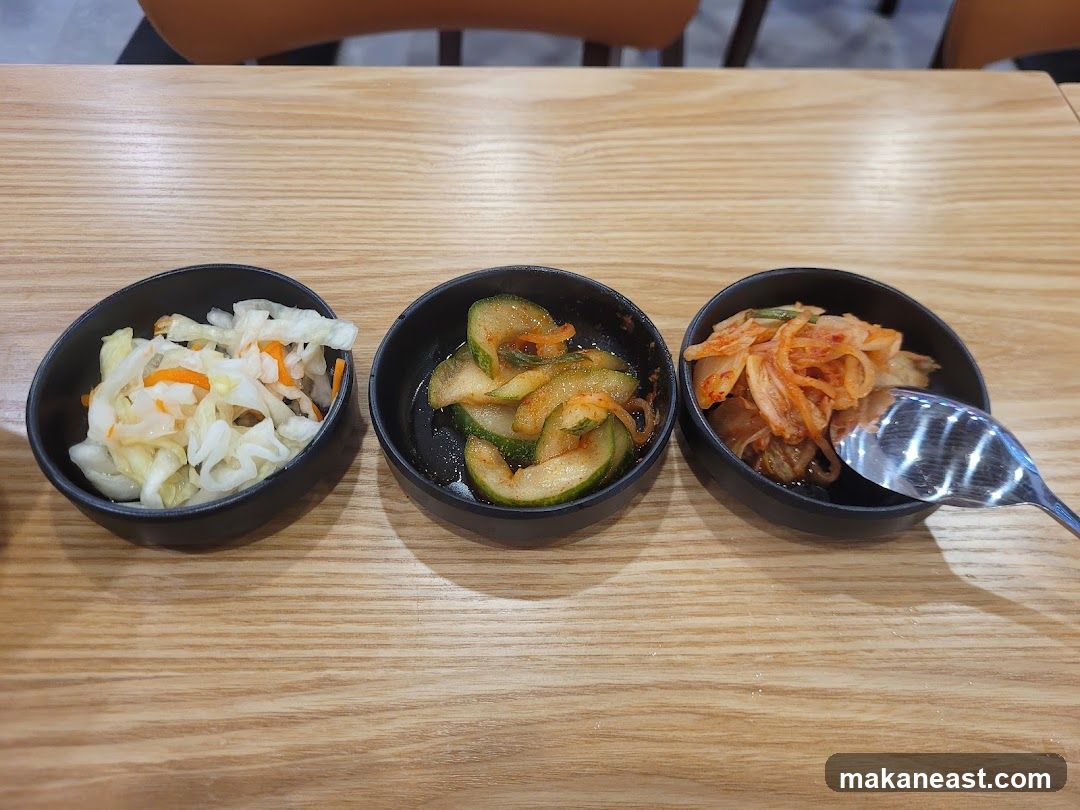 Three Small Bowls of Pickled Vegetables
