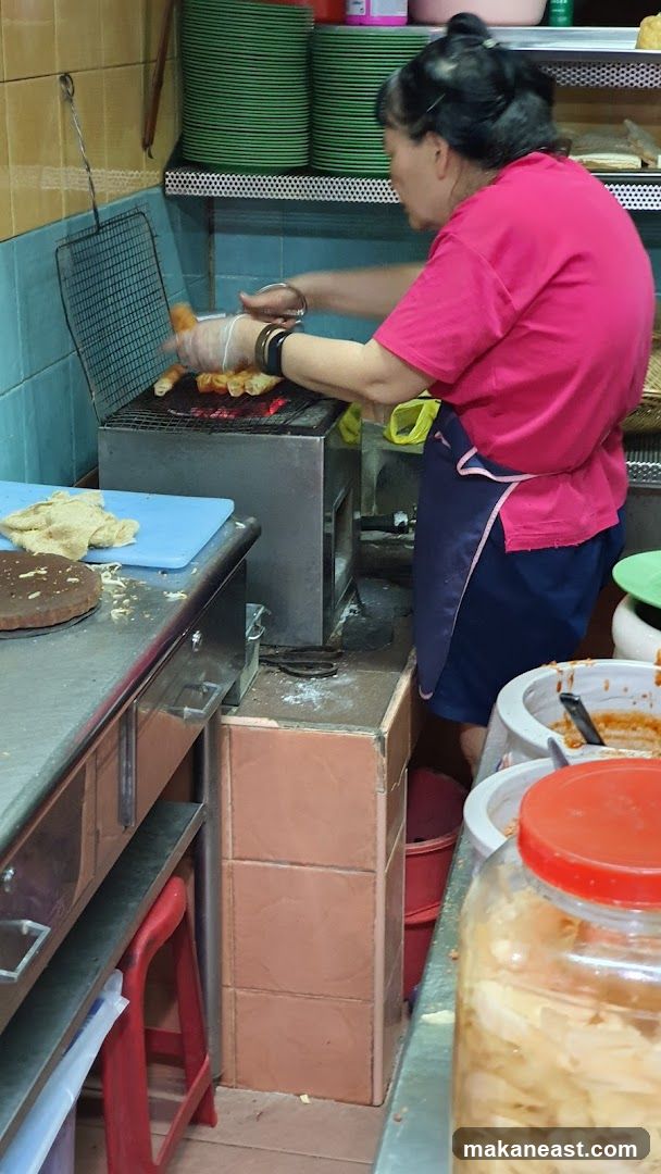 Woman Grilling Food