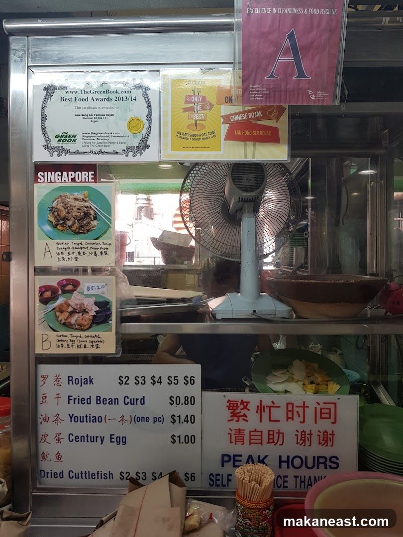 Food stall with awards and menu