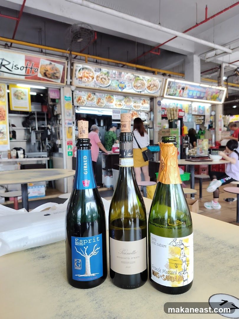 Three bottles of wine on a table