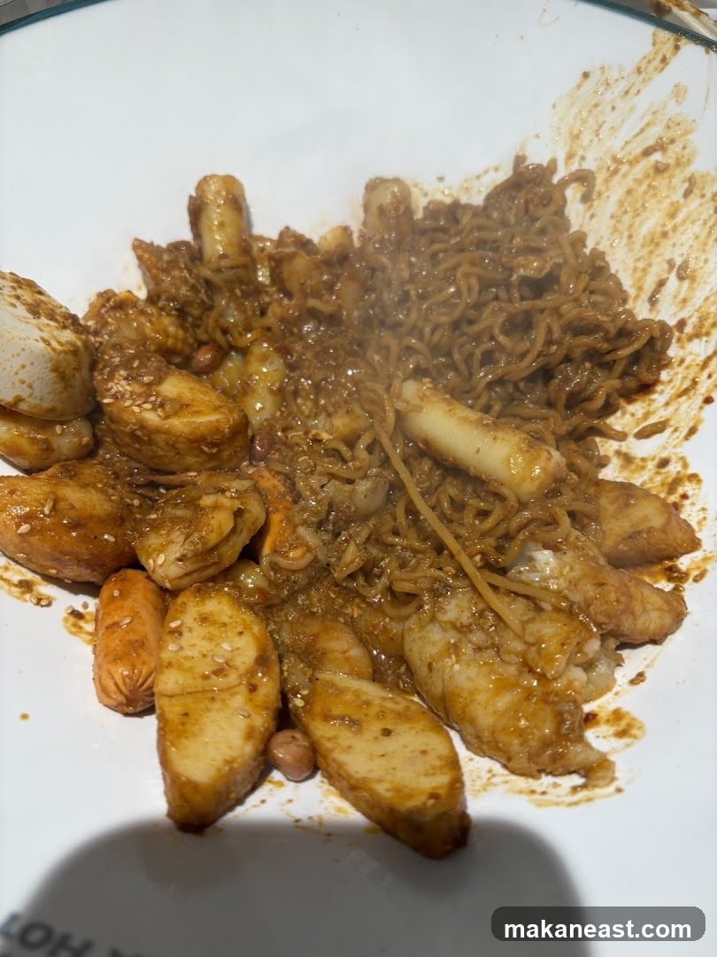 Spicy Noodles with Various Toppings