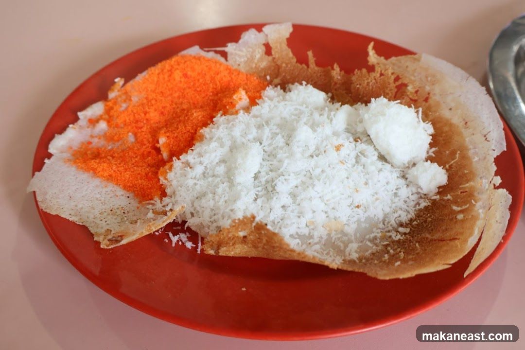 Apom with toppings