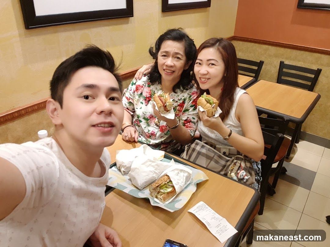 People eating sandwiches