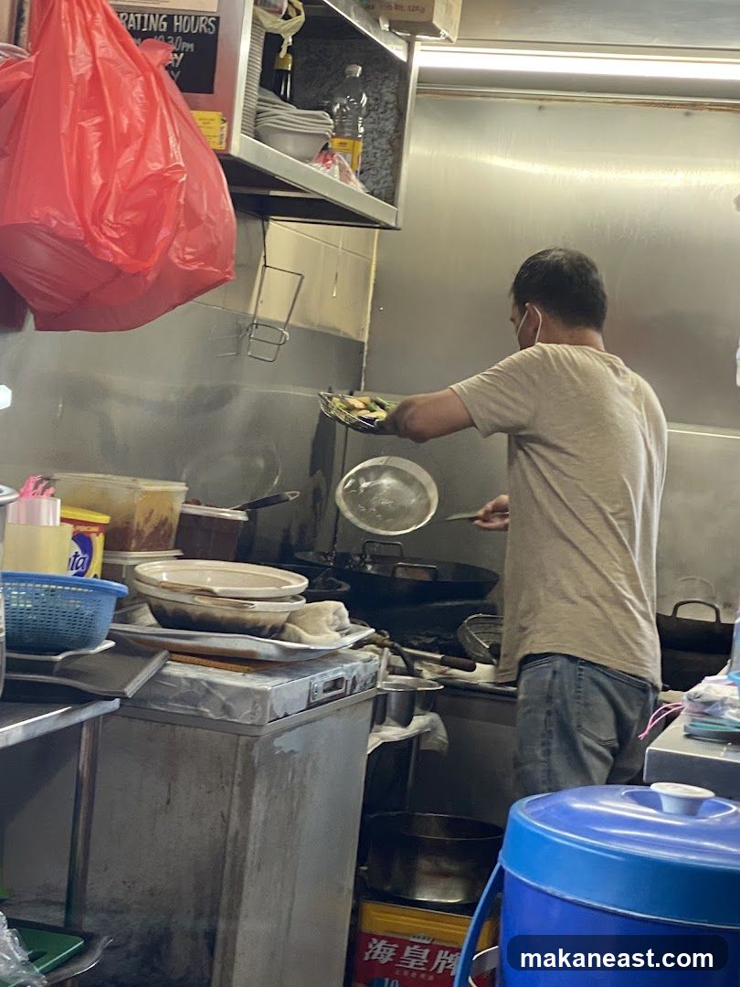 Cook preparing food in a kitchen