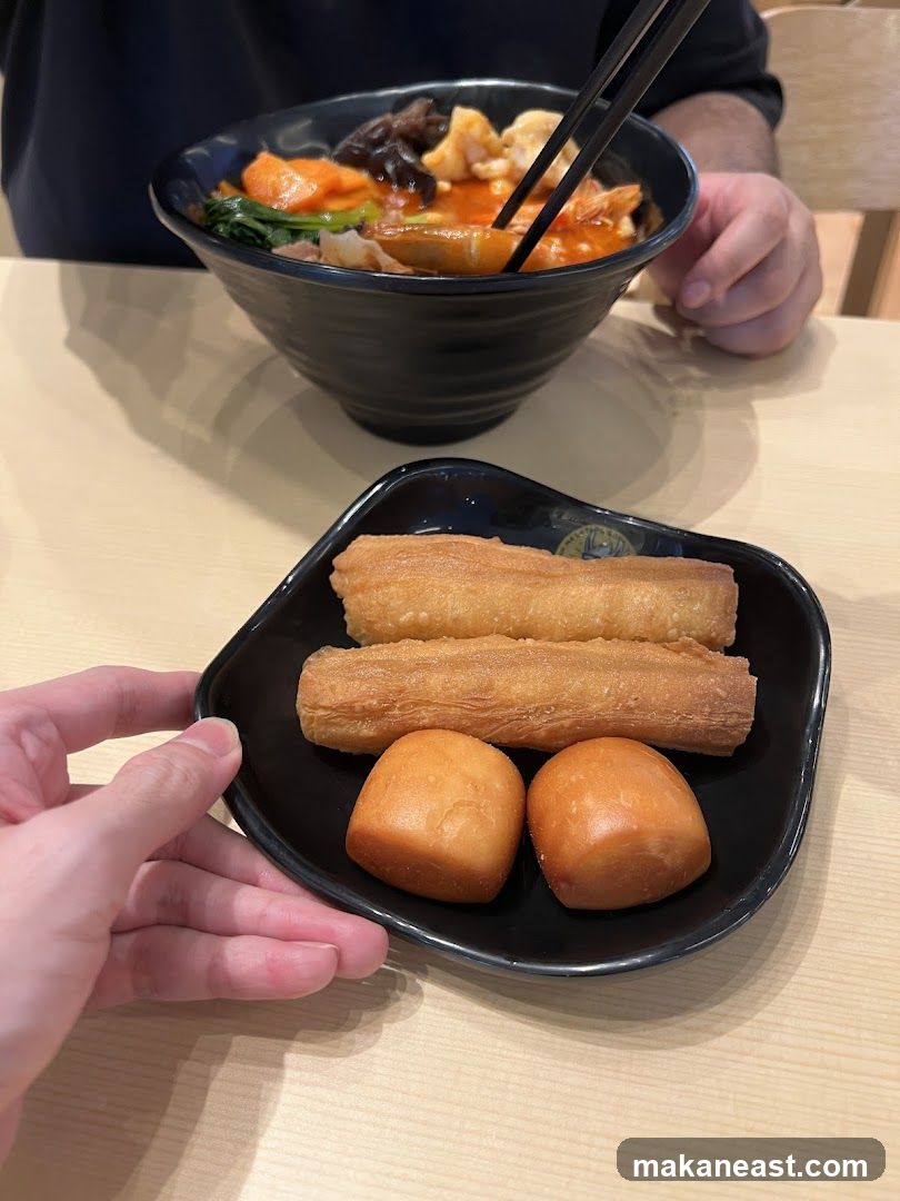 Fried Dough and Steamed Buns with a Bowl of Food